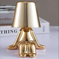Golden Boy Sitting Table Lamp