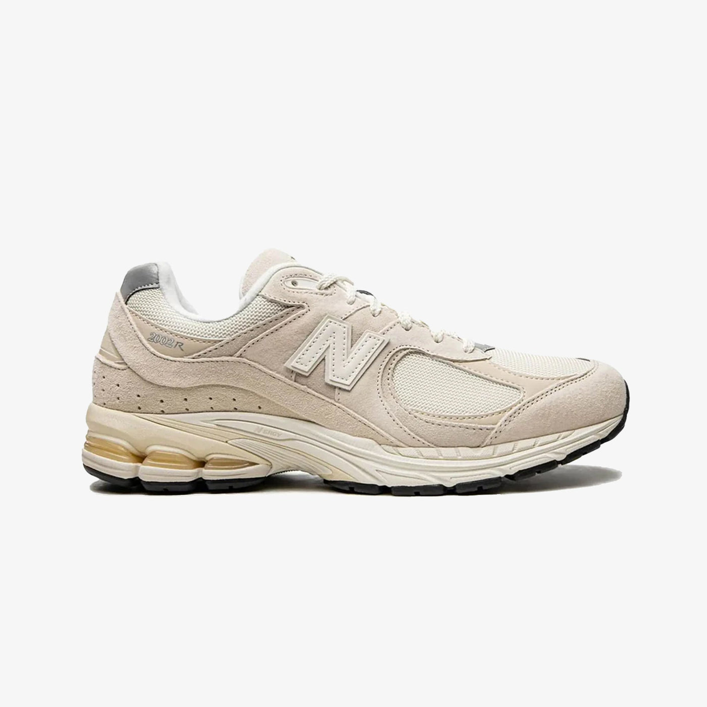 New Balance | 2002R { CREAM/WHITE