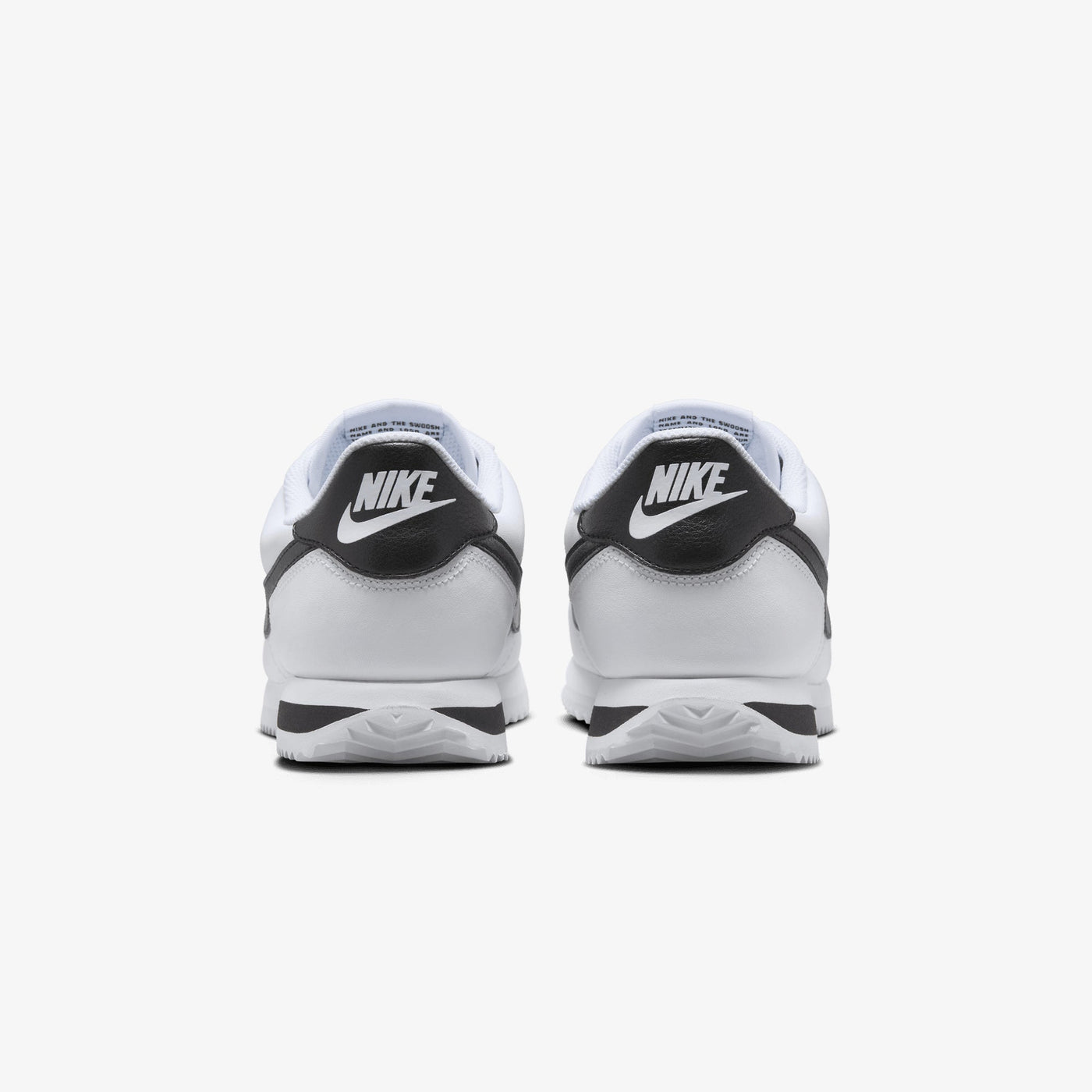 NIKE | CORTEZ LEATHER { WHITE/BLACK